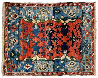 Appraisal: Modern Turkish rug repeating blue lattice designs on salmon ground