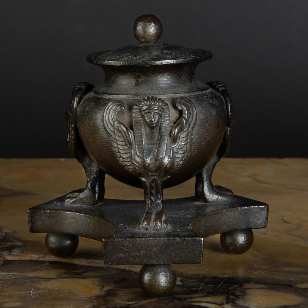 Appraisal: Egyptian Revival Metal Inkwell and Cover Fitted with a glass