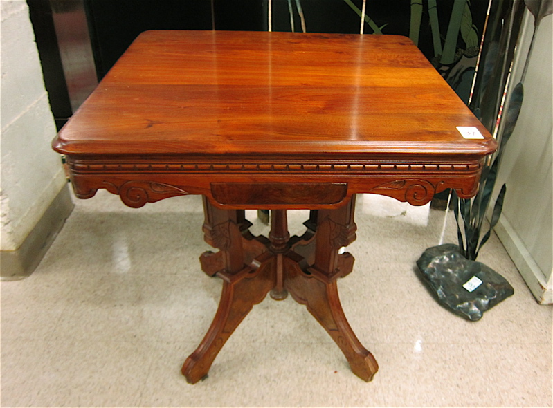 Appraisal: VICTORIAN WALNUT LAMP TABLE American c having a square walnut