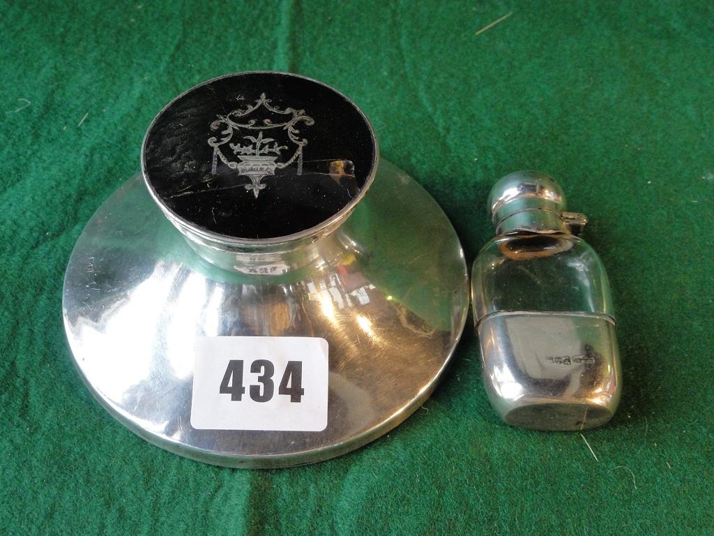 Appraisal: A silver inkwell with tortoiseshell and silver inlaid lid with