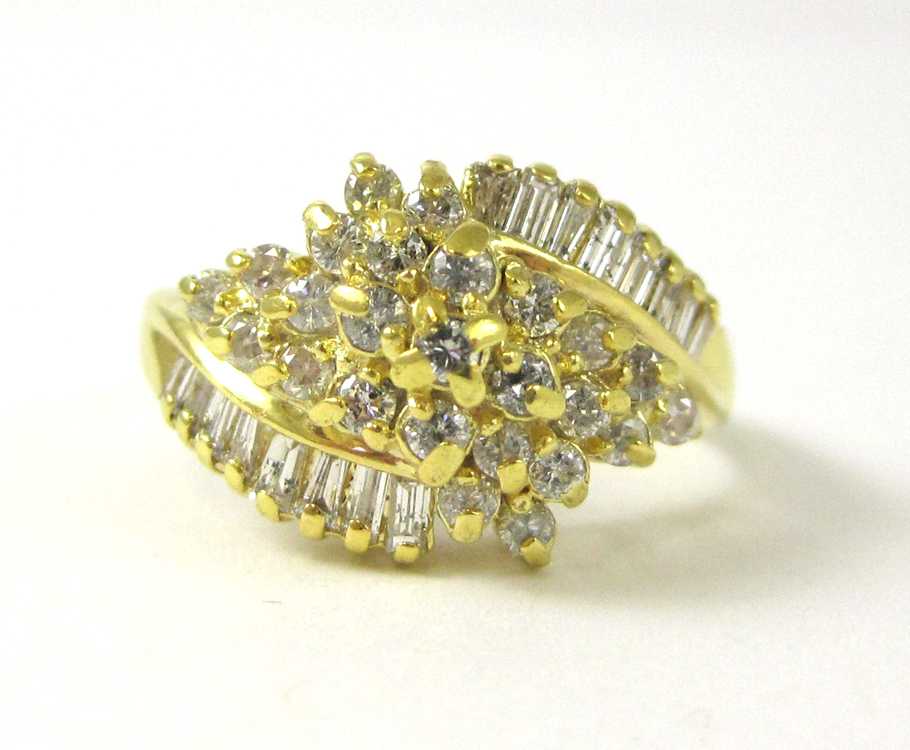 Appraisal: DIAMOND AND FOURTEEN KARAT GOLD CLUSTER RING with two rows