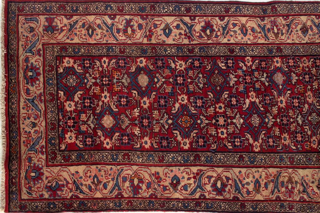 Appraisal: BIJAR RUG the central field with a red ground within