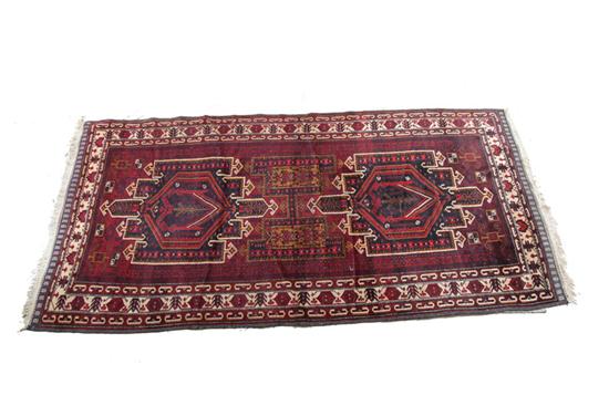 Appraisal: ORIENTAL RUG Late th century Afghan with red ground and