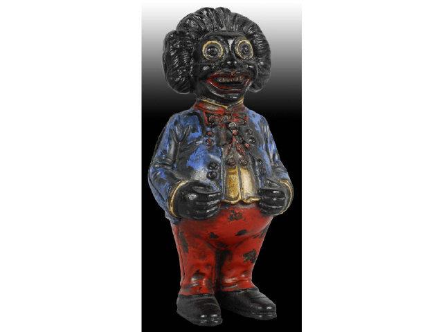 Appraisal: Cast Iron Golliwog Still Bank Description Made by John Harper