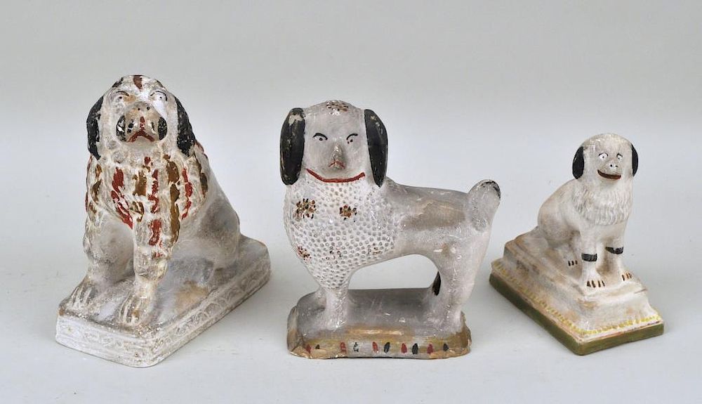 Appraisal: Group Three Chalkware Spaniels painted in shades of light and