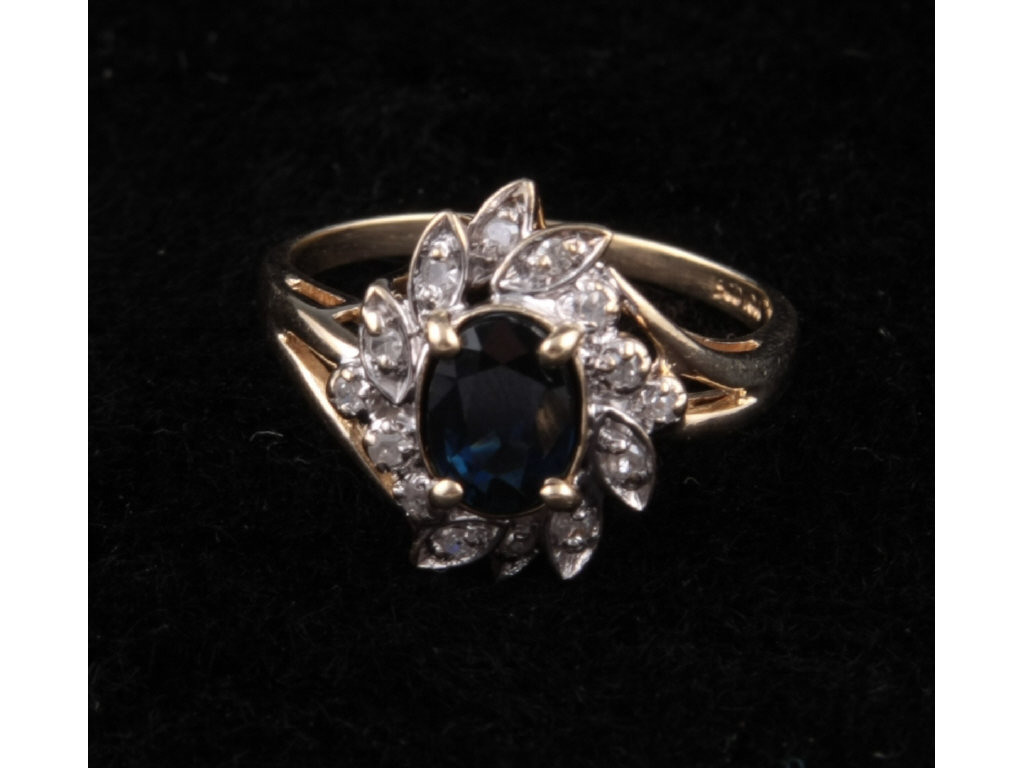 Appraisal: K Yellow Gold Sapphire Diamond Ring featuring one oval sapphire