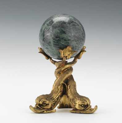 Appraisal: A Decorative Gilt Cast Metal Dolphin Stand with Marble Ball