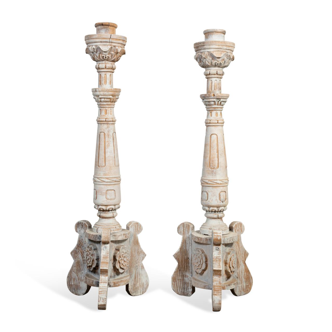 Appraisal: PAIR WHITE DISTRESSED CARVED WOOD TORCHIERES Pair of Continental Baroque