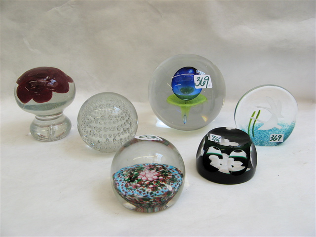 Appraisal: GROUP OF SIX GLASS PAPERWEIGHTS including a variety of globes