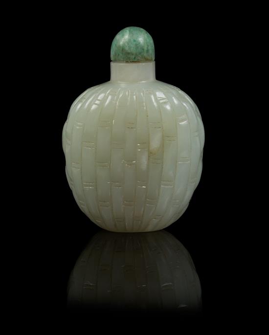 Appraisal: Sale Lot A Celadon Jade Snuff Bottle carved throughout depicting