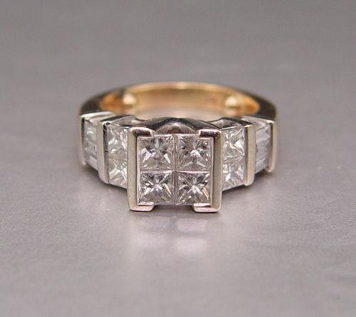 Appraisal: CHANNEL AND INVISIBLE SET DIAMOND RING K two tone white