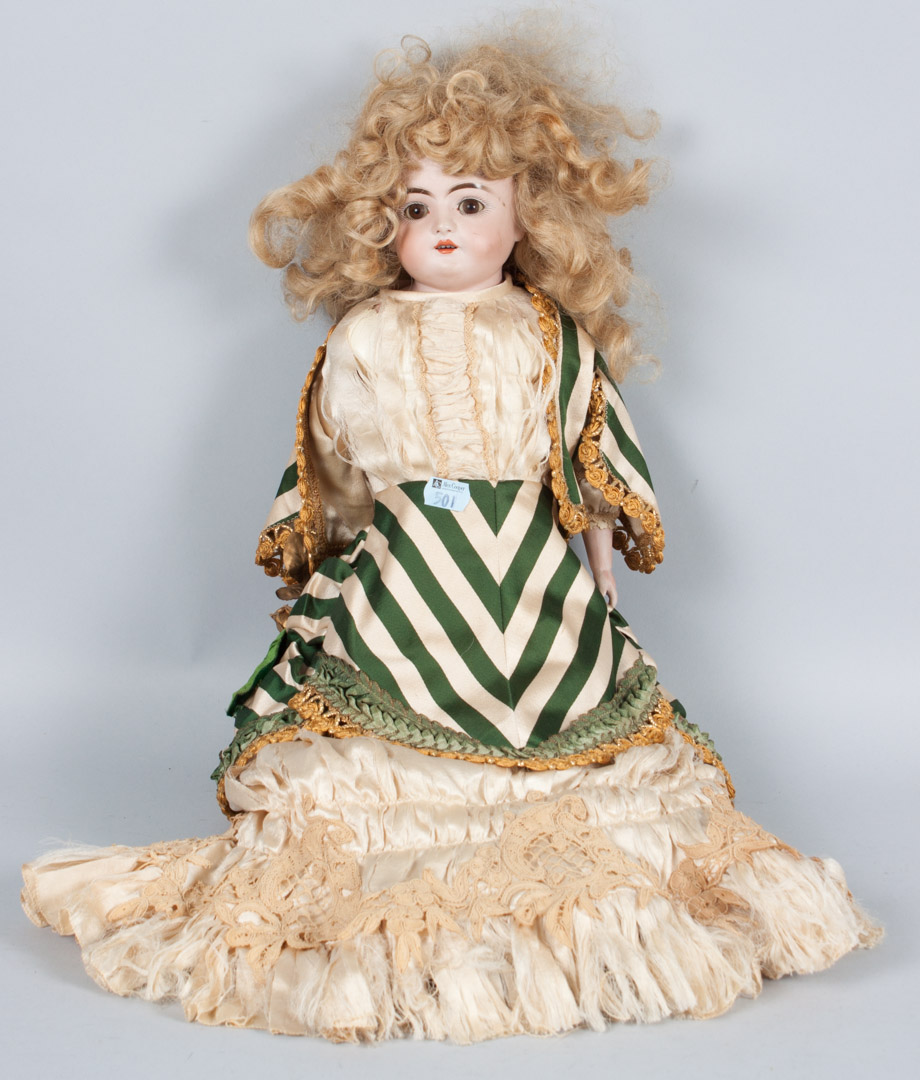 Appraisal: German bisque and cloth body doll with full-length lace dress