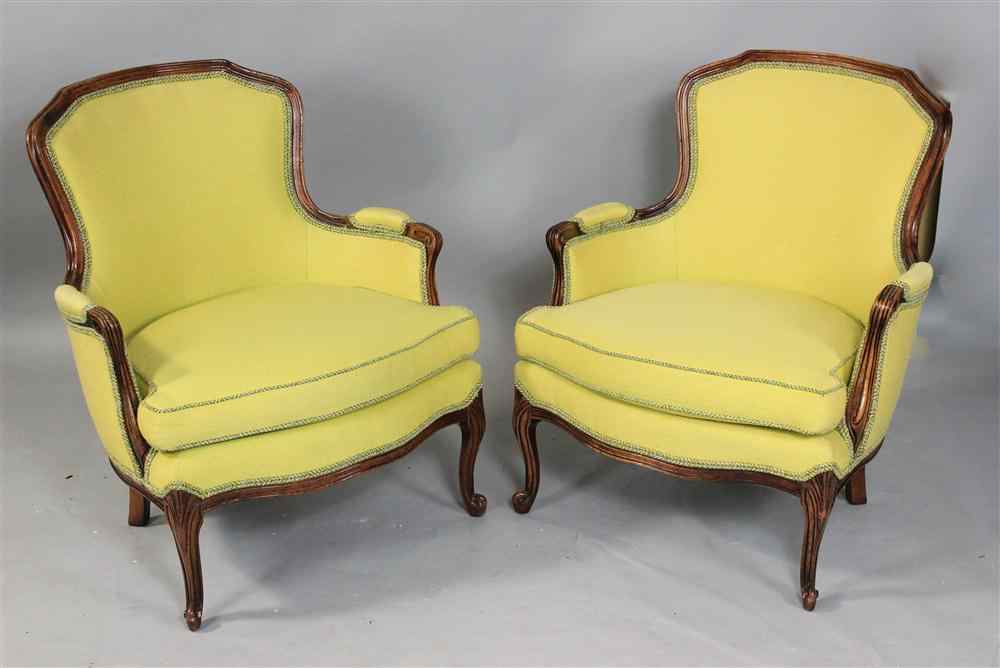 Appraisal: PAIR OF LOUIS XV STYLE FRUITWOOD BERGERES each arched padded