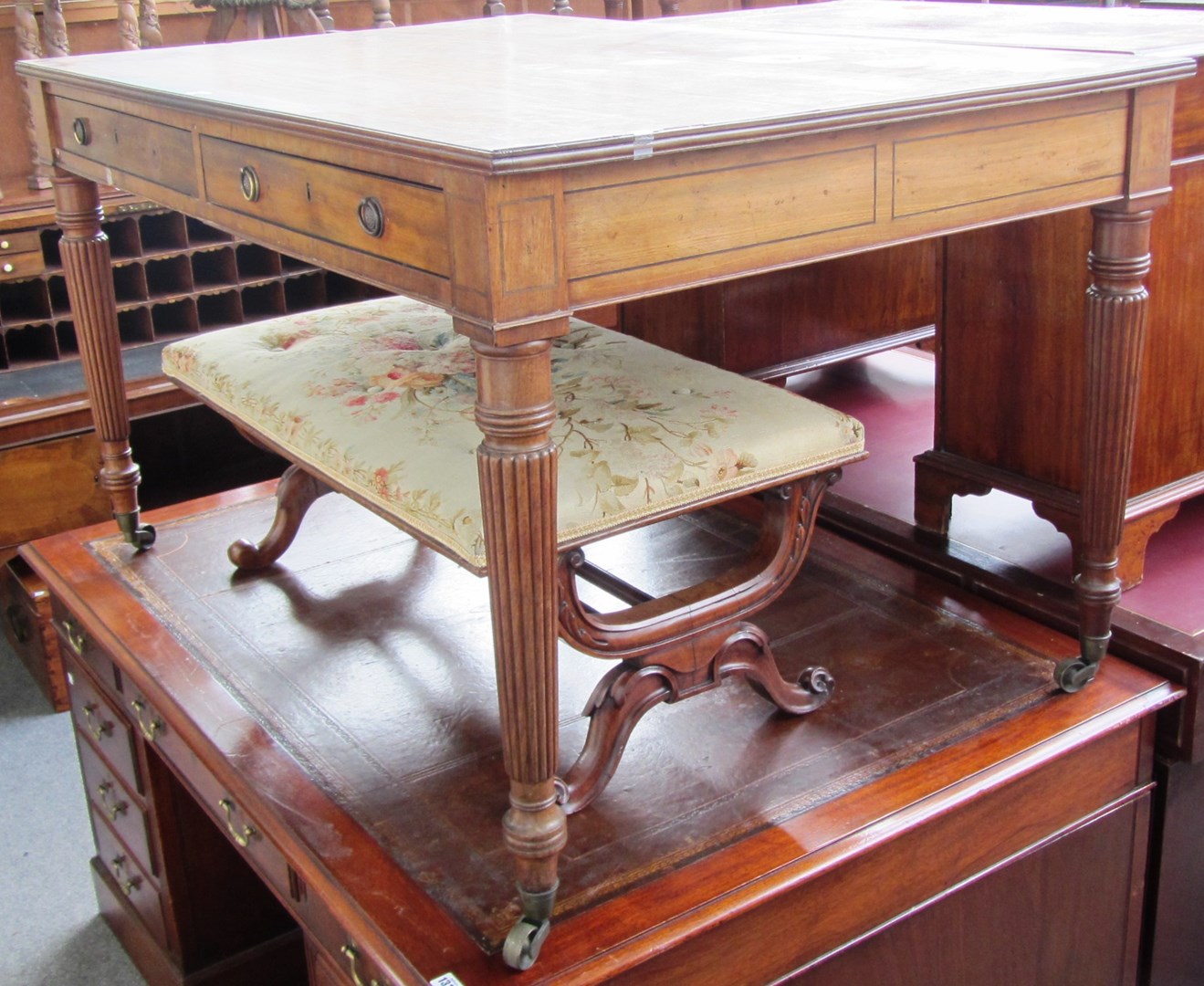 Appraisal: A Regency rectangular mahogany centre table the pair of frieze