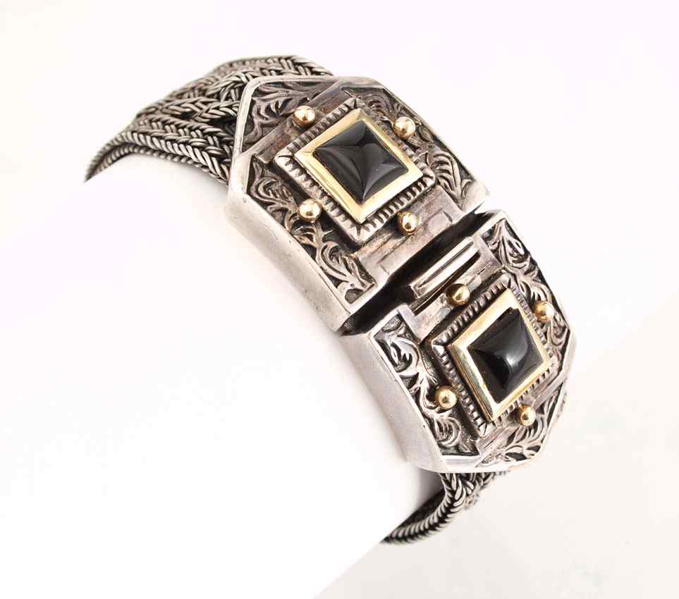 Appraisal: STERLING K ONYX BRACELET Intricately woven sterling silver bracelet with