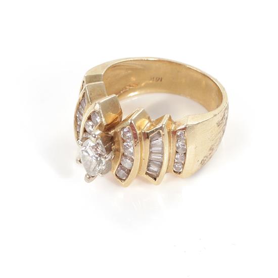 Appraisal: Diamond and gold ring ct marquise center diamond color H