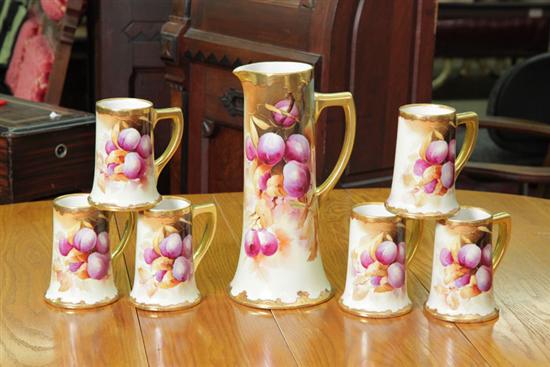 Appraisal: LIMOGES LEMONADE SET Seven piece set with floral decoration and