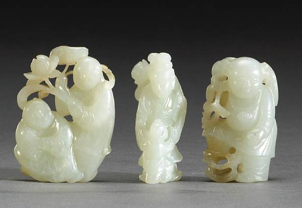 Appraisal: A group of three white jade carvings The first a