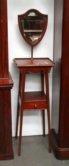 Appraisal: A mahogany and brass dressing stand