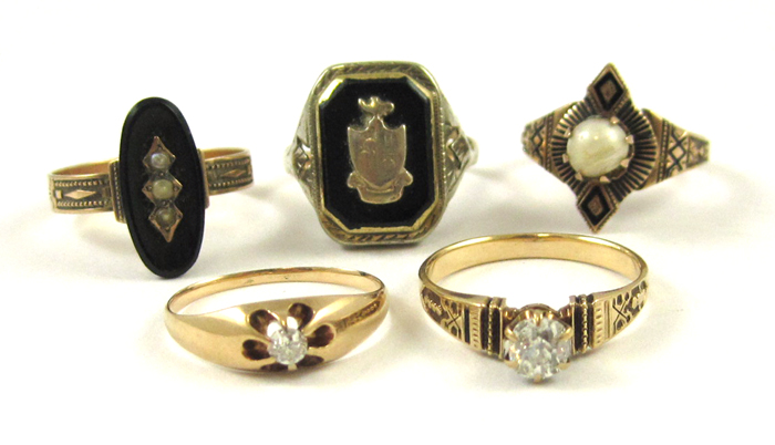 Appraisal: FIVE FOURTEEN KARAT GOLD RINGS set with a single round-cut