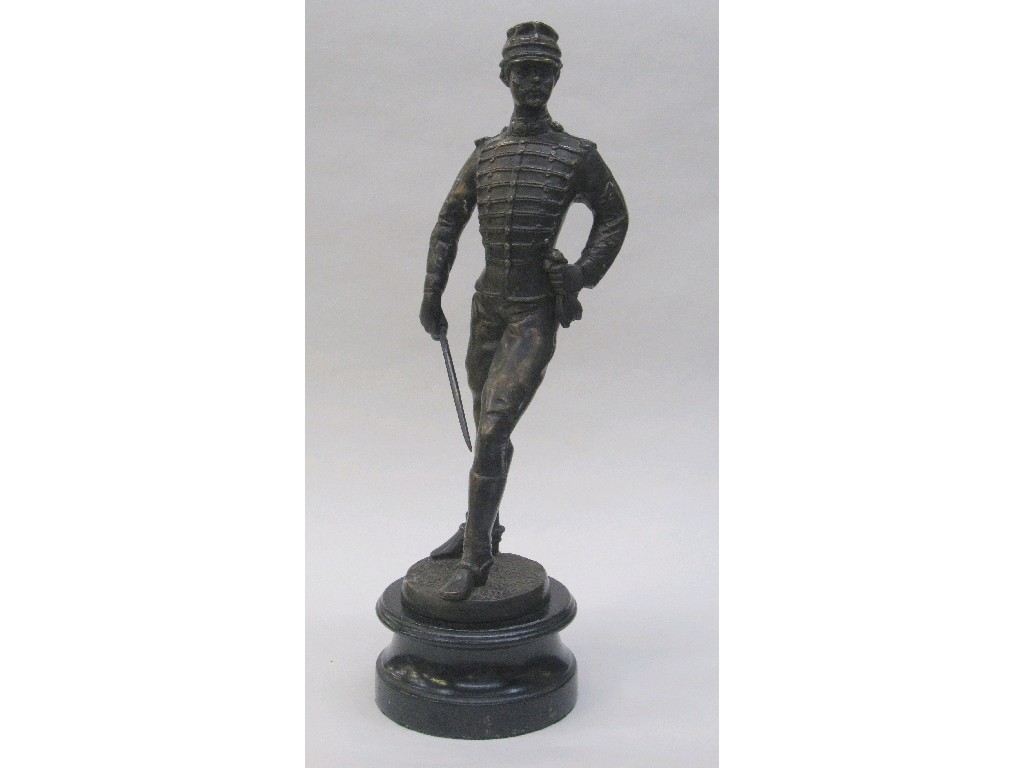 Appraisal: French bronzed metal figure of a military officer upon ebonised