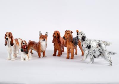 Appraisal: Seven Royal Doulton figures of dogs including English setter spaniel