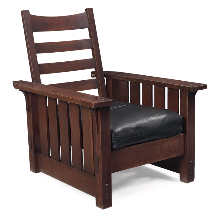 Appraisal: Gustav Stickley Morris chair five vertical slats under each arm