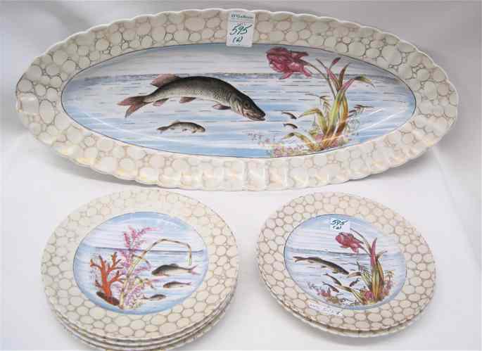 Appraisal: SIX PIECE GERMAN PORCELAIN FISH SET each with an enameled