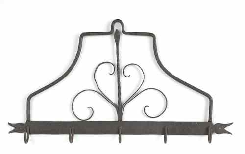 Appraisal: Wrought iron utensil rack ca with tulip terminals h w