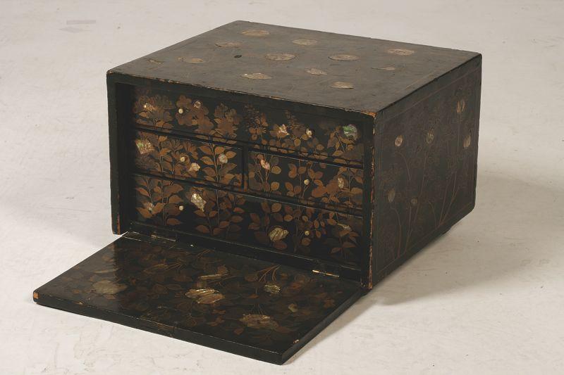 Appraisal: A JAPANESE LACQUER BOX decorated in mother of pearl and