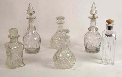 Appraisal: A pair of cut glass decanters with reeded mushroom stoppers