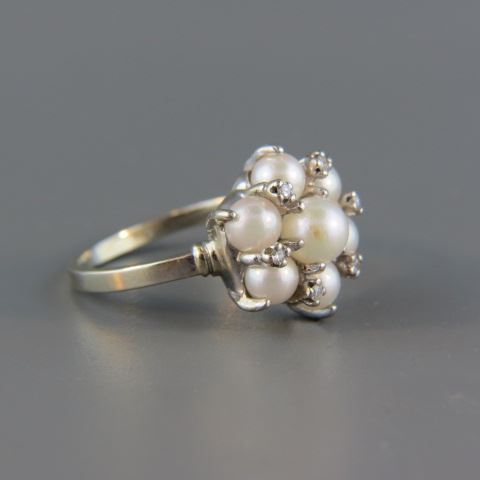 Appraisal: Pearl Diamond Ring lusterous pearls and small diamonds in k