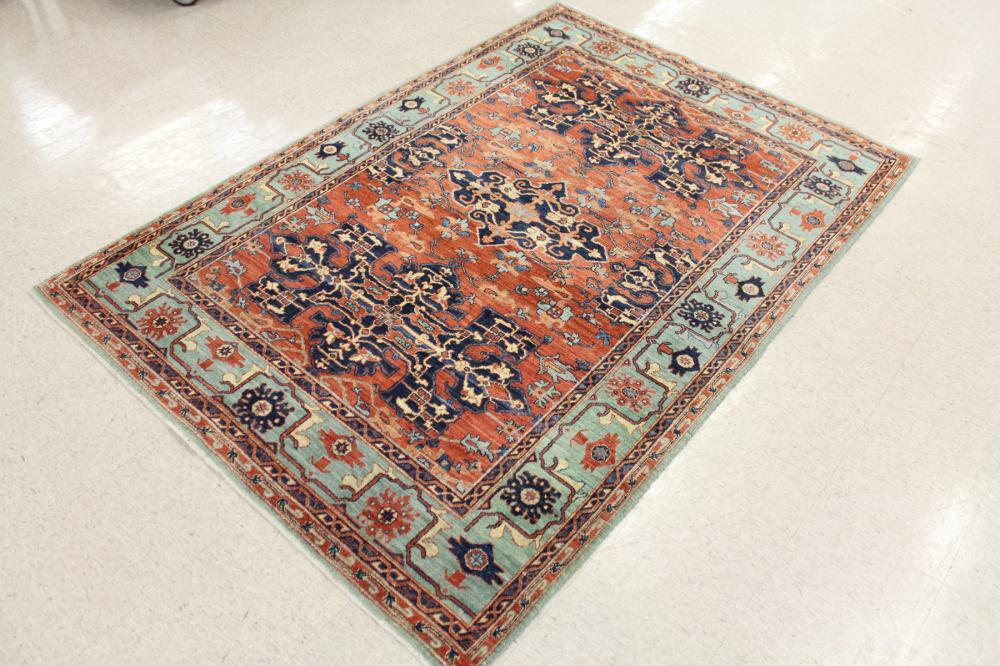 Appraisal: HAND KNOTTED ORIENTAL AREA RUG Pakistani-Caucasian triple curvilinear medallion design