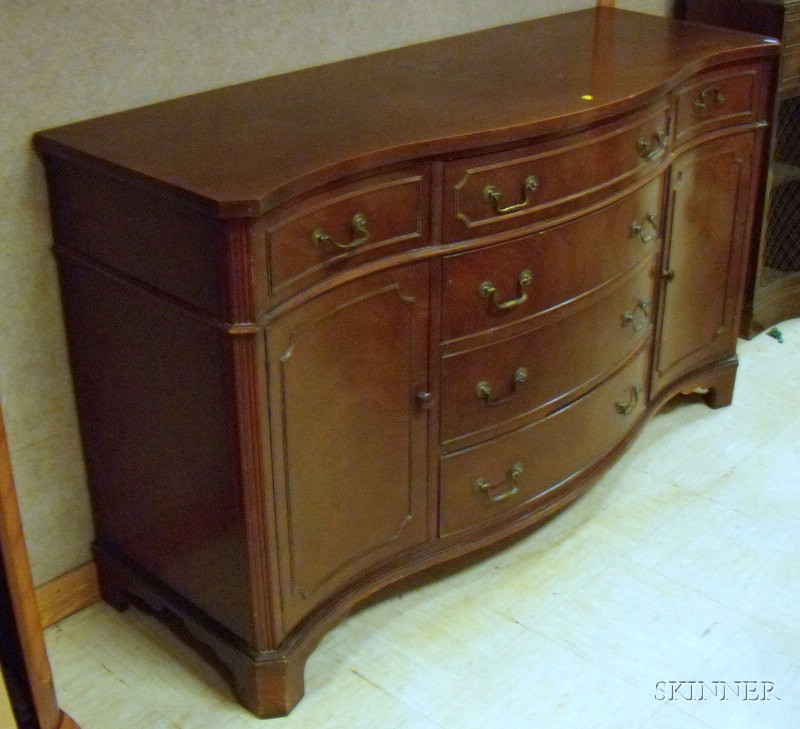 Appraisal: Georgian-style Mahogany and Mahogany Veneer Serpentine Sideboard lg in