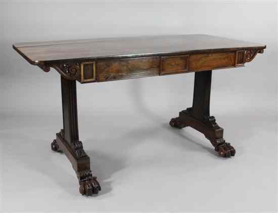 Appraisal: A William IV rosewood library table with two drawers on