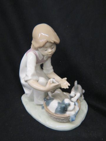 Appraisal: Lladro Porcelain Figurine of Young Girlwith puppies basket excellent