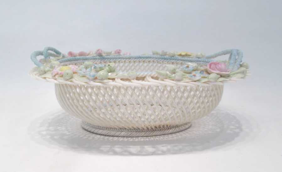 Appraisal: IRISH BELLEEK PORCELAIN FOUR STRAND BASKET oval with twig handles