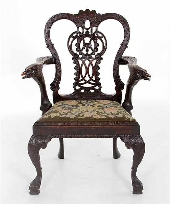 Appraisal: Fine Irish Chippendale style carved mahogany armchair th century foliate-carved