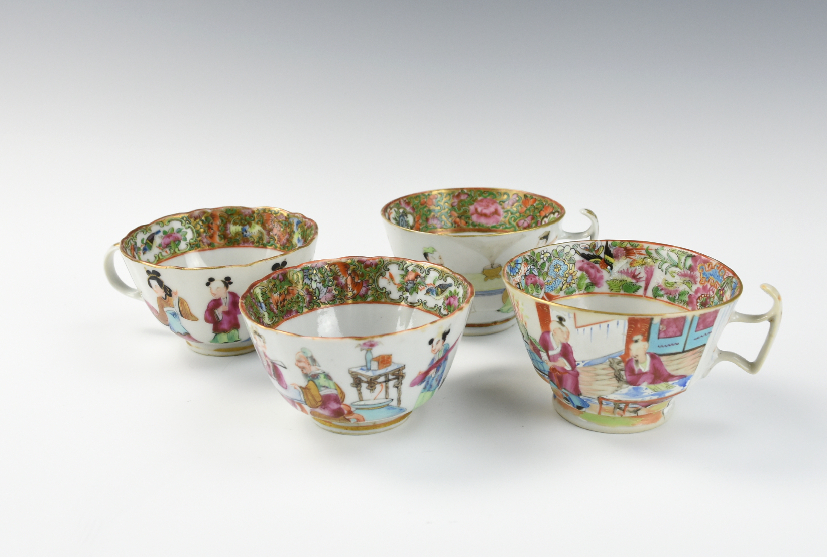 Appraisal: CHINESE CANTON GLAZED CUPS W FIGURES TH C Chinese th