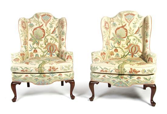 Appraisal: Pair of Wingback Armchairs having cruel upholstery with floral design