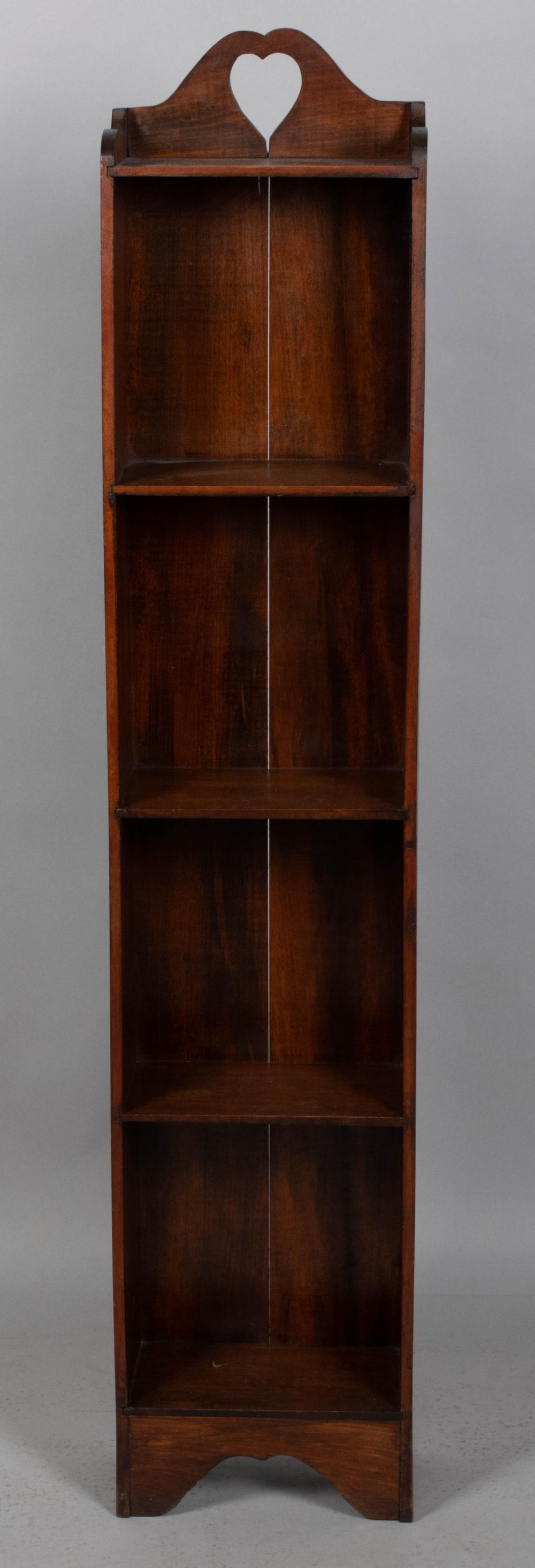 Appraisal: COUNTRY WALNUT DWARF BOOKCASE the arched cornice pierced with a