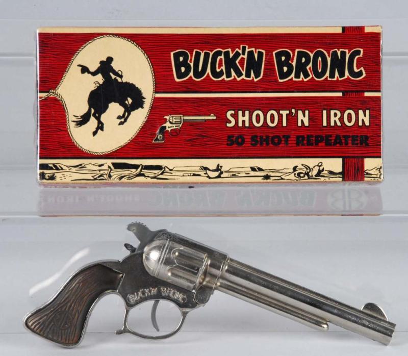 Appraisal: Buck N Bronc Schmidt Cap Gun Description Gun has fired