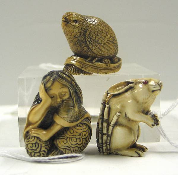 Appraisal: Three tinted ivory netsuke studies Including one of a rabbit