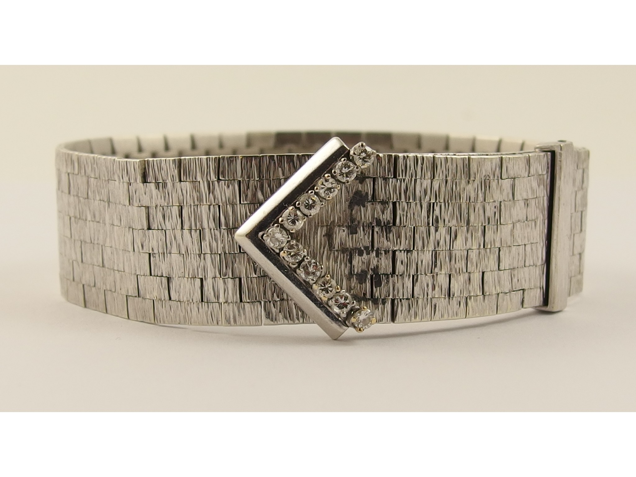 Appraisal: A ct white gold woven diamond set braceletwith bark textured