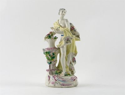 Appraisal: A large Bow figure of Flora standing draped in a