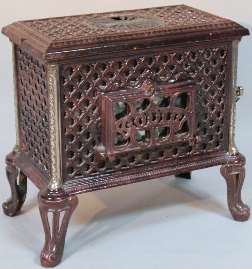 Appraisal: A Godin cast iron Chauffette stove the rectangular body profusely