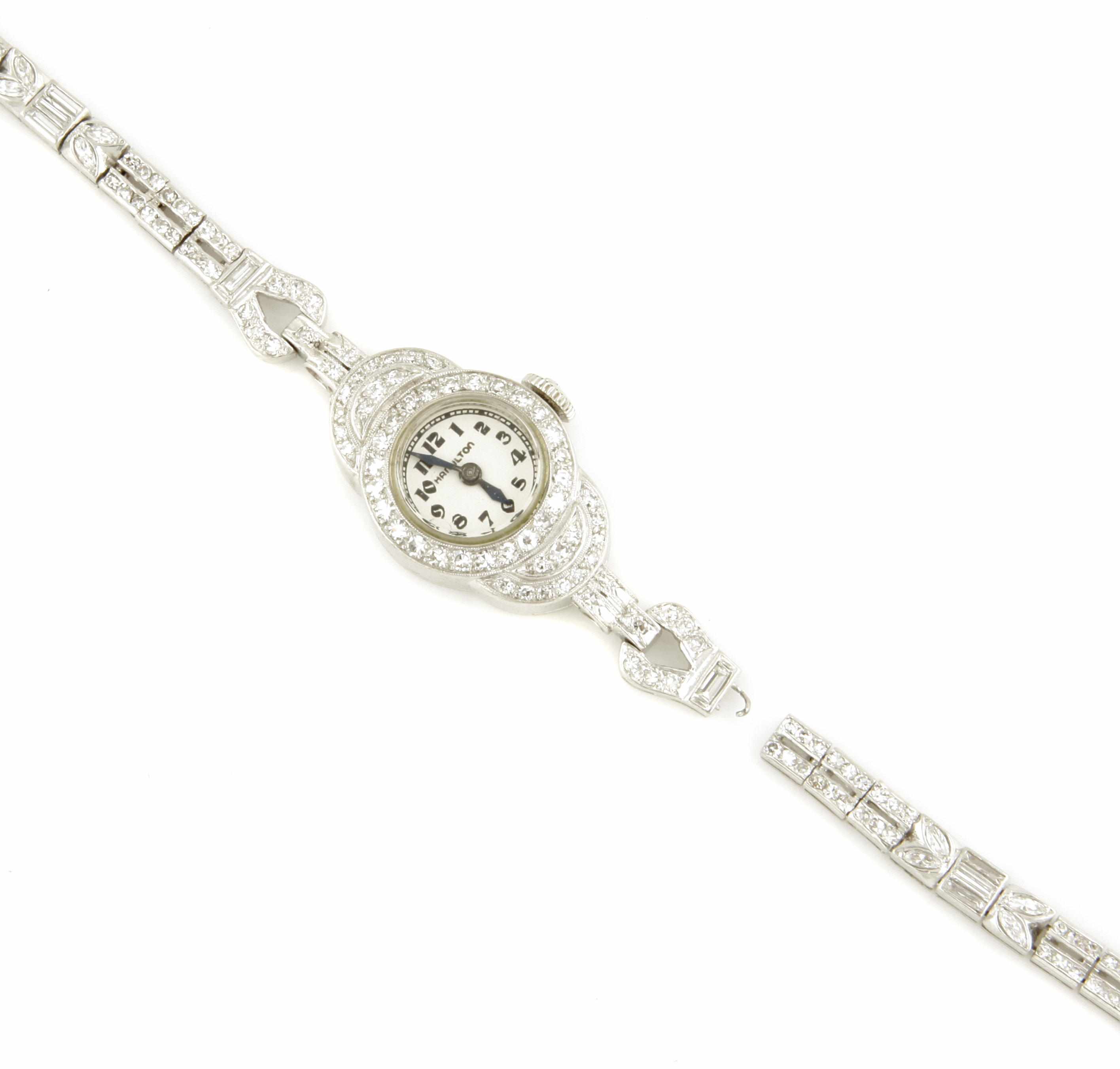 Appraisal: A lady's diamond and platinum bracelet wristwatch Hamilton with steel