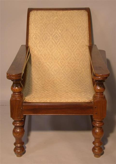 Appraisal: ANGLO INDIAN CARVED EXOTIC HARDWOOD PLANTER'S CHAIR the canted cane