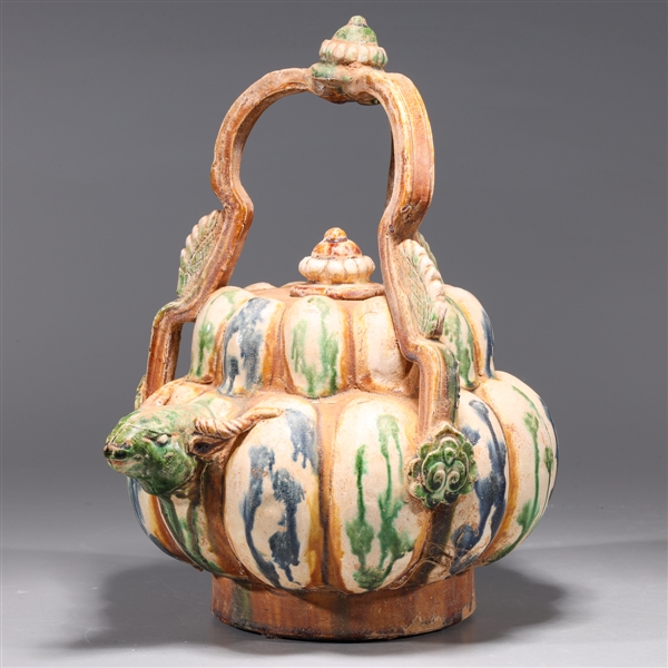 Appraisal: Chinese archaistic sancai glazed vessel with molded foliate and bull