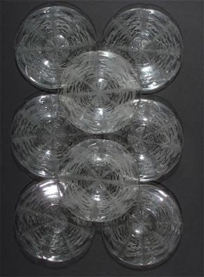 Appraisal: Pissenlit' nine Lalique clear and frosted glass plates designed by